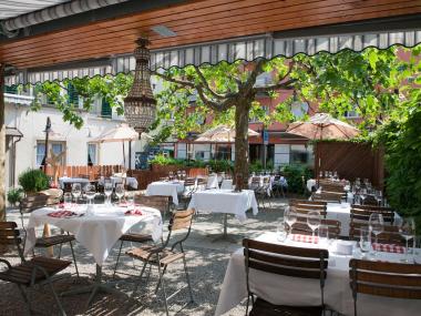 Idyllic garden terrace Drei Stuben Zurich Restaurant